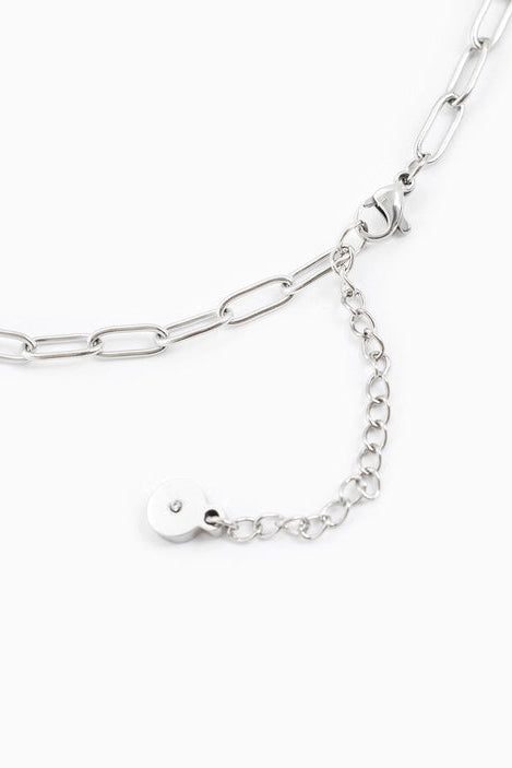 Silver chain necklace on a white background